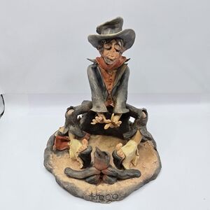 Hand Crafted Cowboy Sculpture - Gray, Orange, and Tan